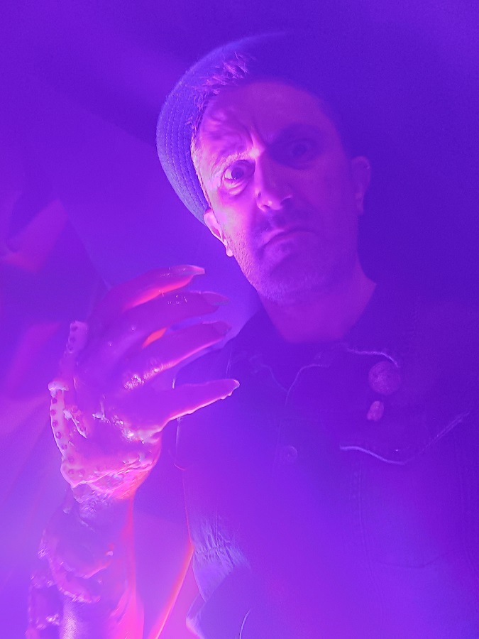 Nathan Head doubling as The Mogern's forearm in the original ending